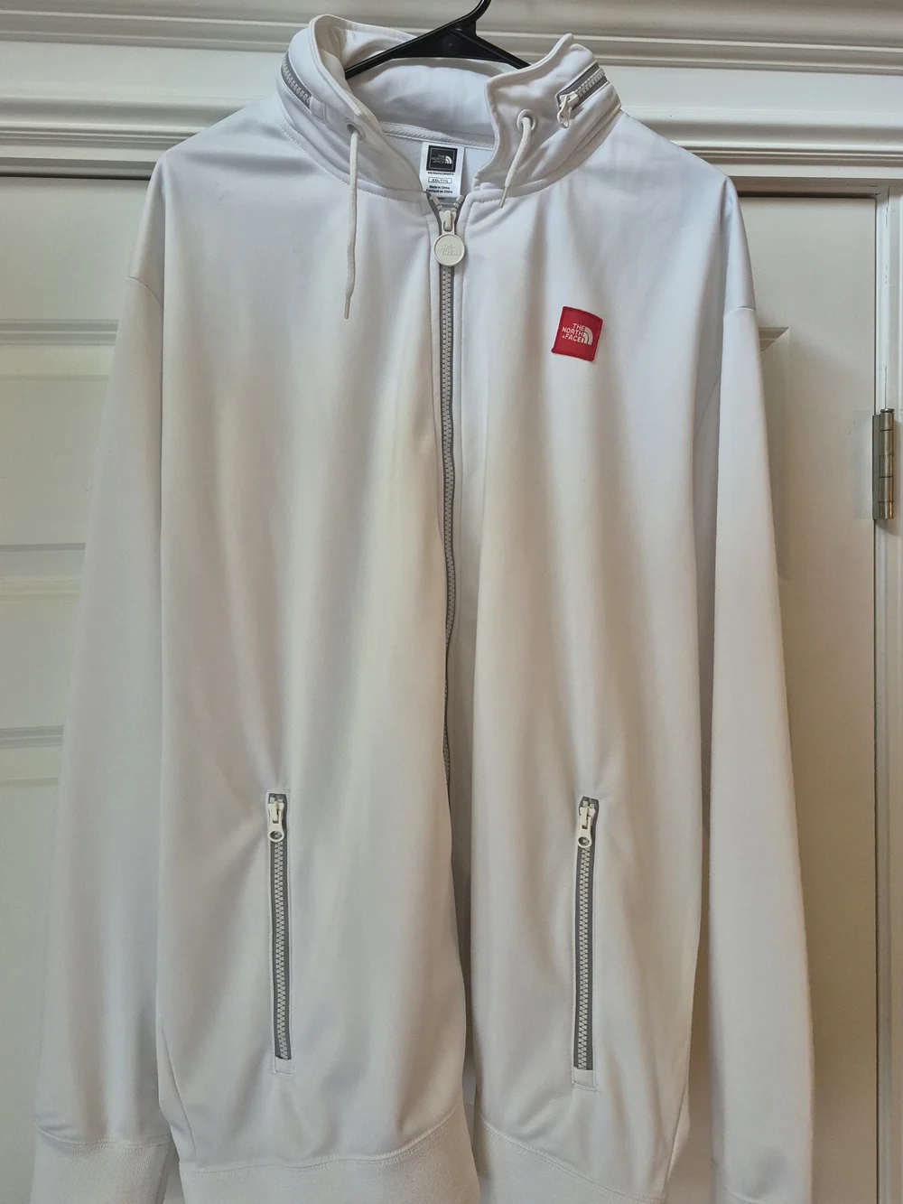 The North Face White Hooded Zip-Up Jacket with Red Logo
